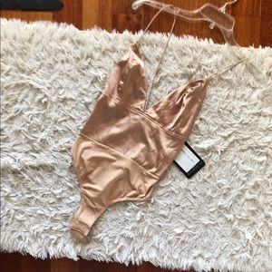 MISSGUIDED: BRAND NEW Tan satin low cut bodysuit